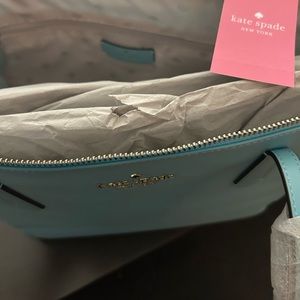 Brand new with Tag KATE SPADE purse/tote. Beautiful blue/teal color.
